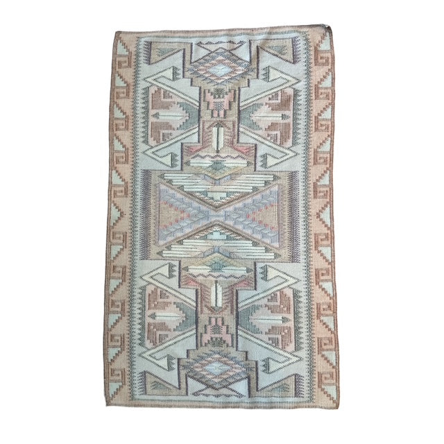 Woven rug with geometric pattern on a white background.  Navajo rug for sale, raised outline navajo weaving 